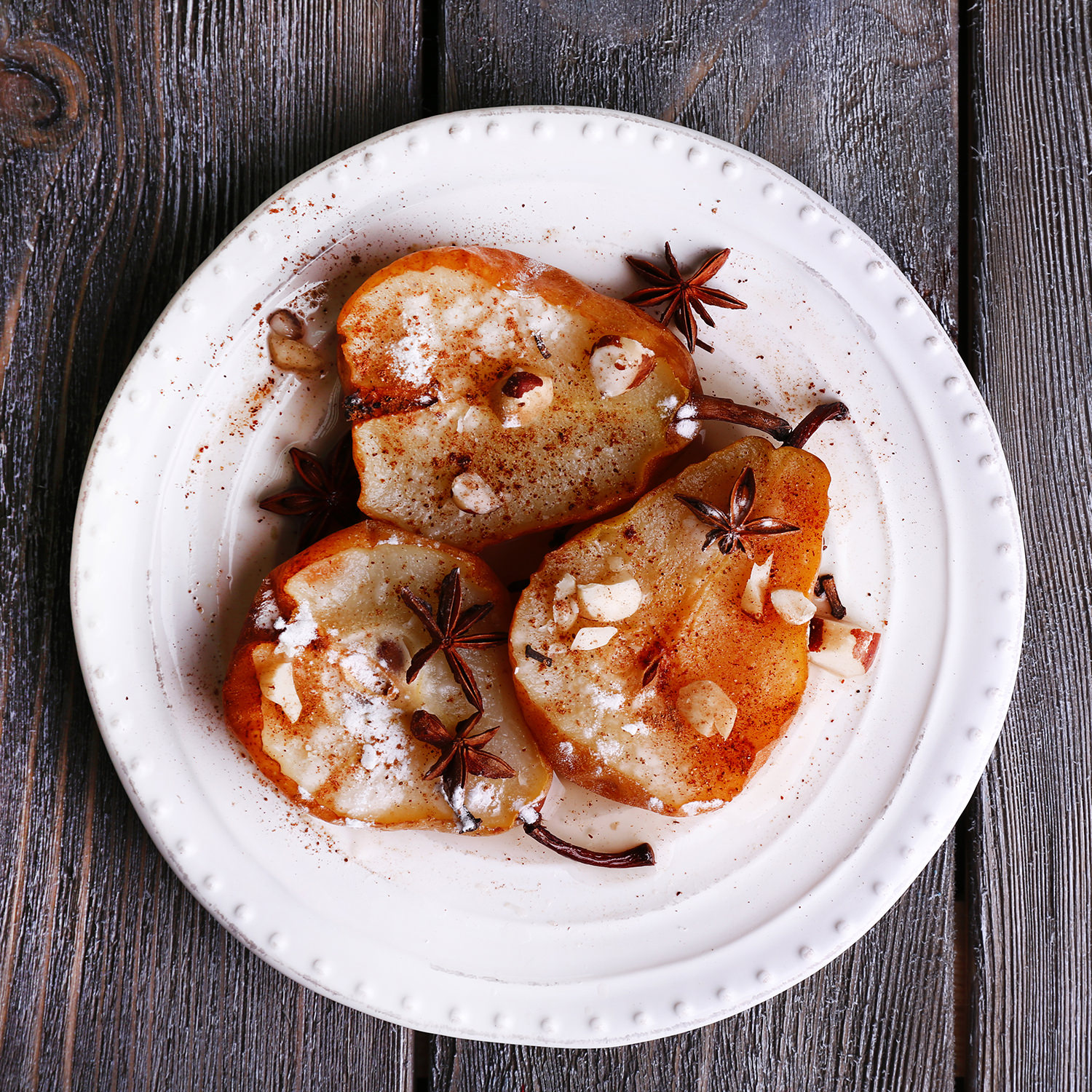 Pere Williams cotte con spezie e frutta secca